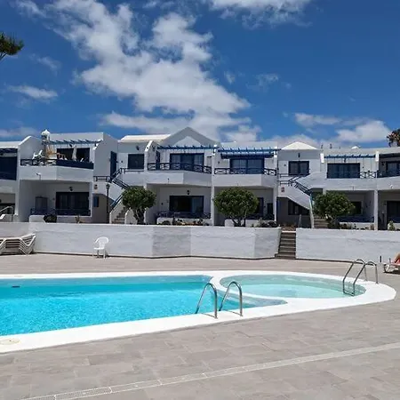 Three Orchids Lägenhet